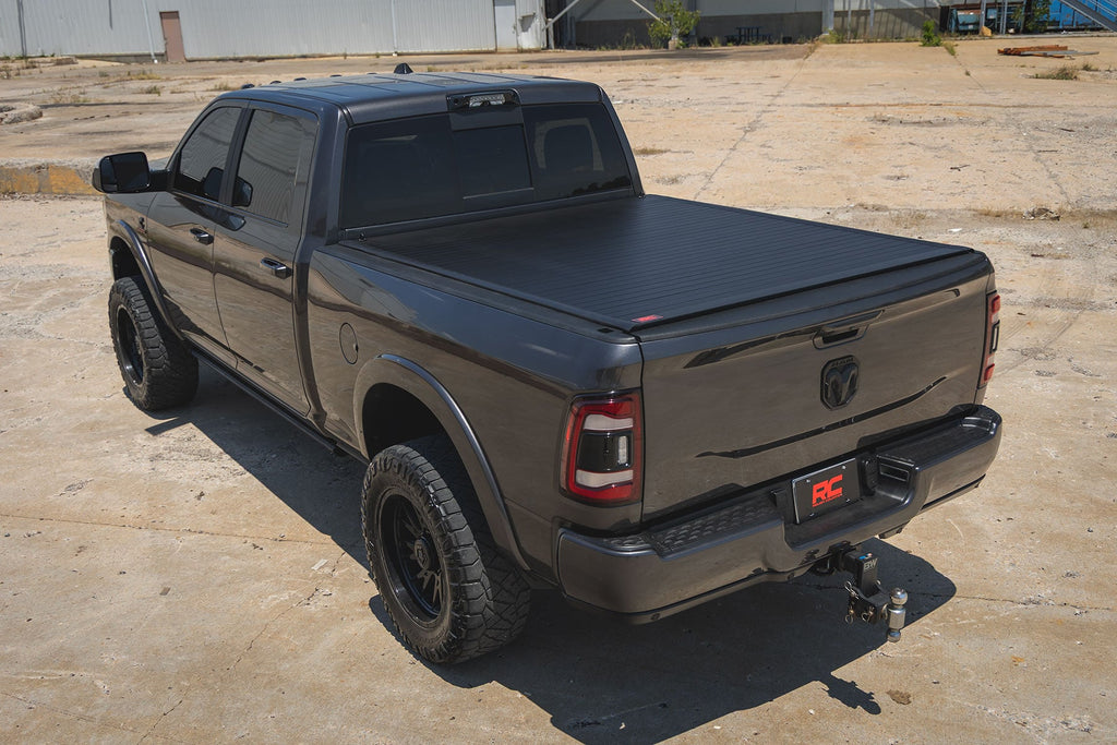 Hard Roll Up Bed Cover | 6'4" Bed | Ram 1500 (09-18)/2500 (09-26) by Rough Country