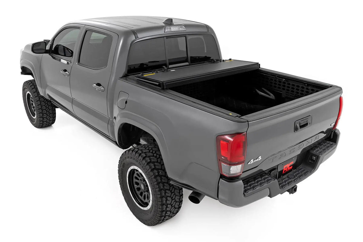 Hard Tri-Fold Flip Up Bed Cover | 5' Bed | Toyota Tacoma 2WD/4WD (2016-2023) by Rough Country
