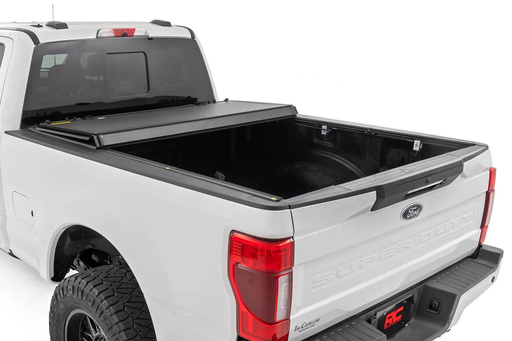 Hard Tri-Fold Flip Up Bed Cover | 6'10" Bed | Ford F-250/F-350 Super Duty (17-26) by Rough Country