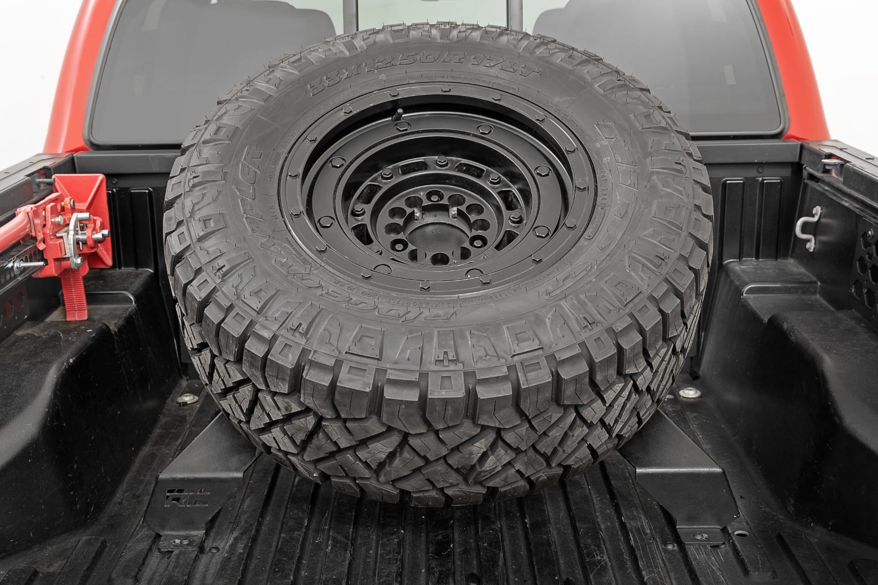 Bed Mount Spare Tire Carrier | Universal (5x5.5 6x5.5 6x135 & 5x5.0 Bolt Patterns) by Rough Country