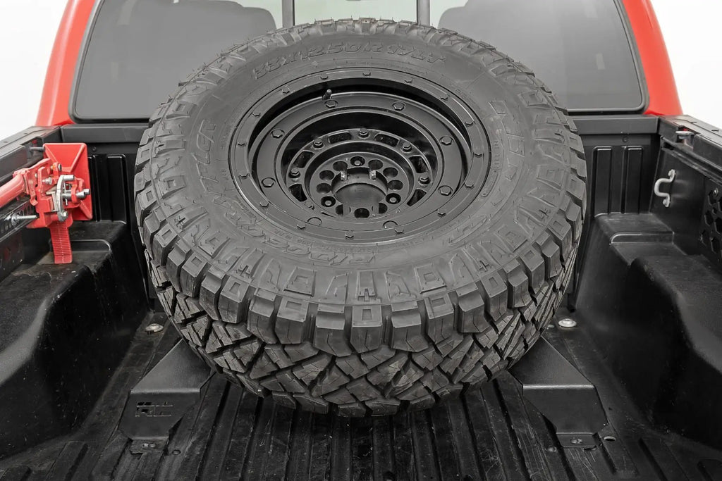 Bed Mount Spare Tire Carrier | Universal (5x5.5 6x5.5 6x135 & 5x5.0 Bolt Patterns) by Rough Country
