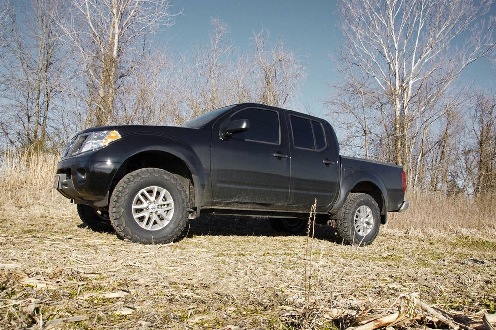 2.5 Inch Leveling Kit | Red Spacers | Nissan Frontier (05-26)/Xterra (05-15) by Rough Country