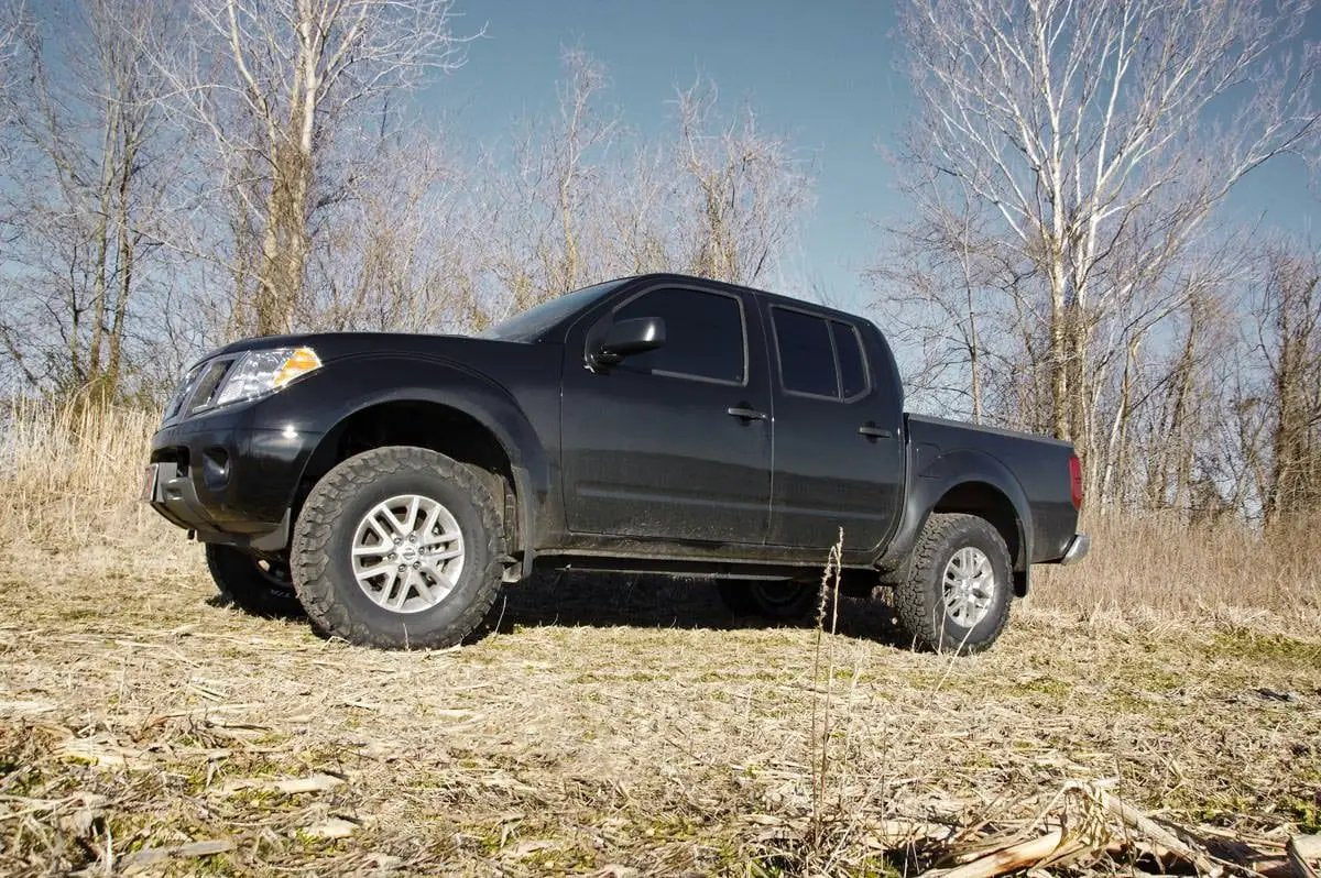 2.5 Inch Leveling Kit | Red Spacers | Nissan Frontier (05-26)/Xterra (05-15) by Rough Country