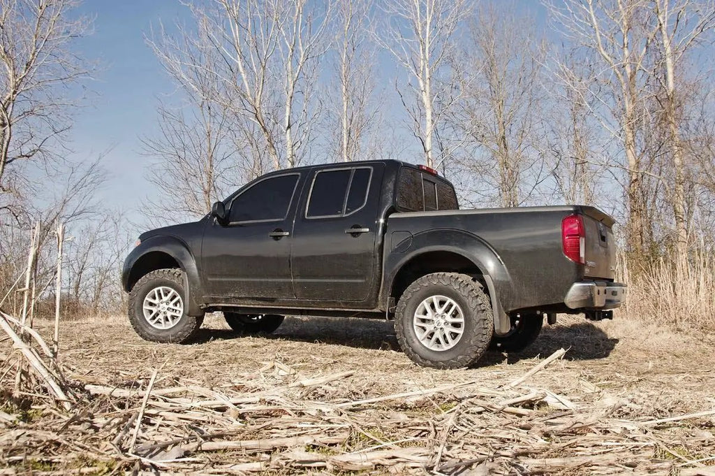 2.5 Inch Leveling Kit | Red Spacers | Nissan Frontier (05-26)/Xterra (05-15) by Rough Country