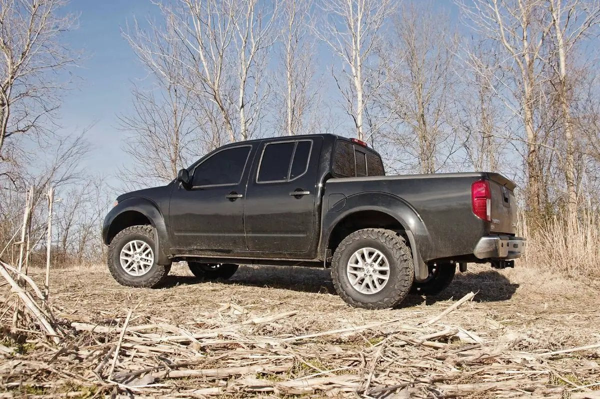 2.5 Inch Leveling Kit | Red Spacers | Nissan Frontier (05-26)/Xterra (05-15) by Rough Country
