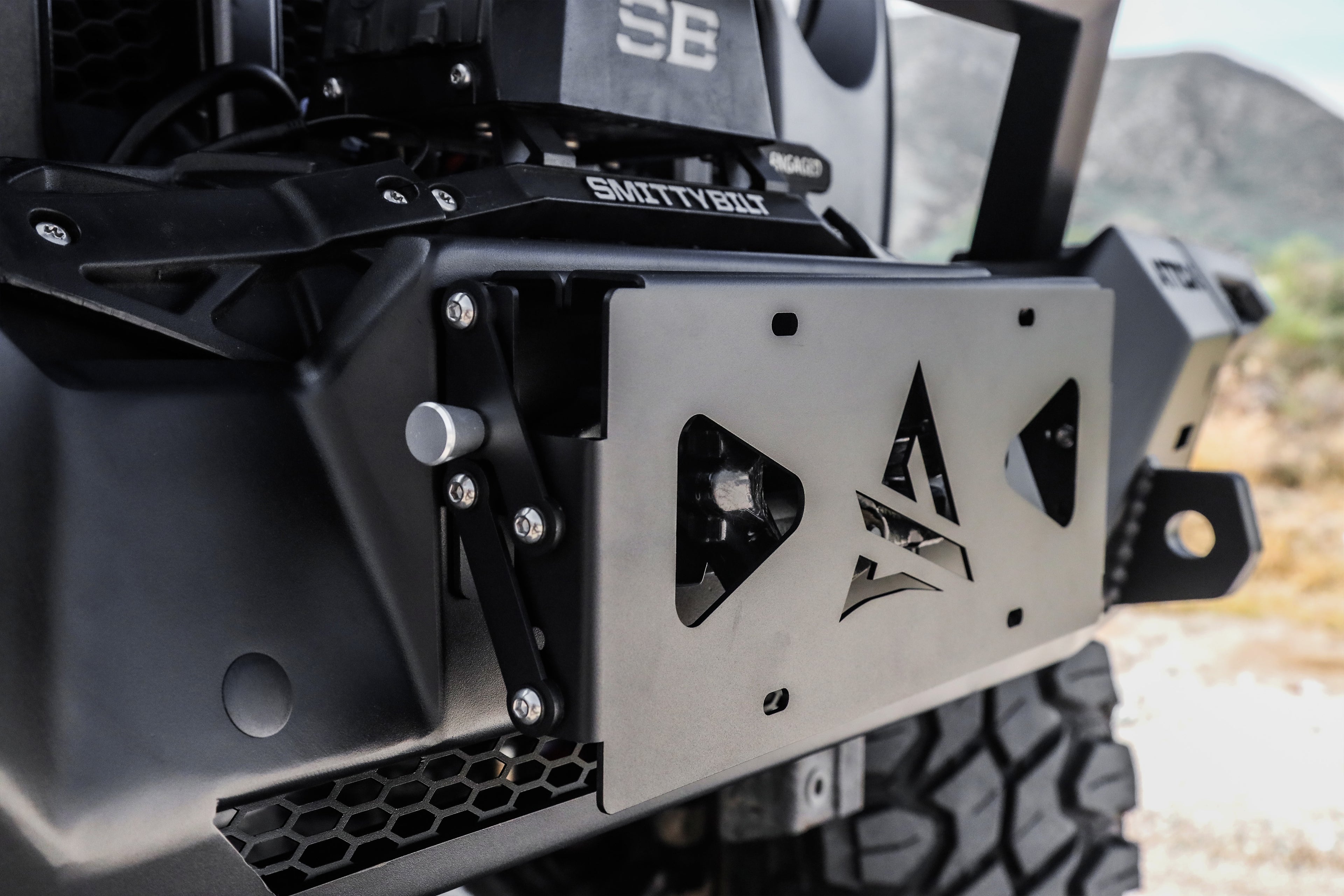 Universal Terra Series Flip-Up Roller Fairlead License Plate Bracket by Attica 4x4