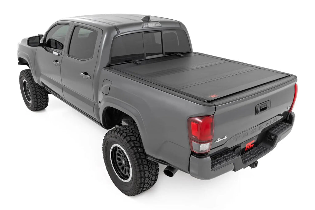 Hard Tri-Fold Flip Up Bed Cover | 5' Bed | Toyota Tacoma 2WD/4WD (2016-2023) by Rough Country
