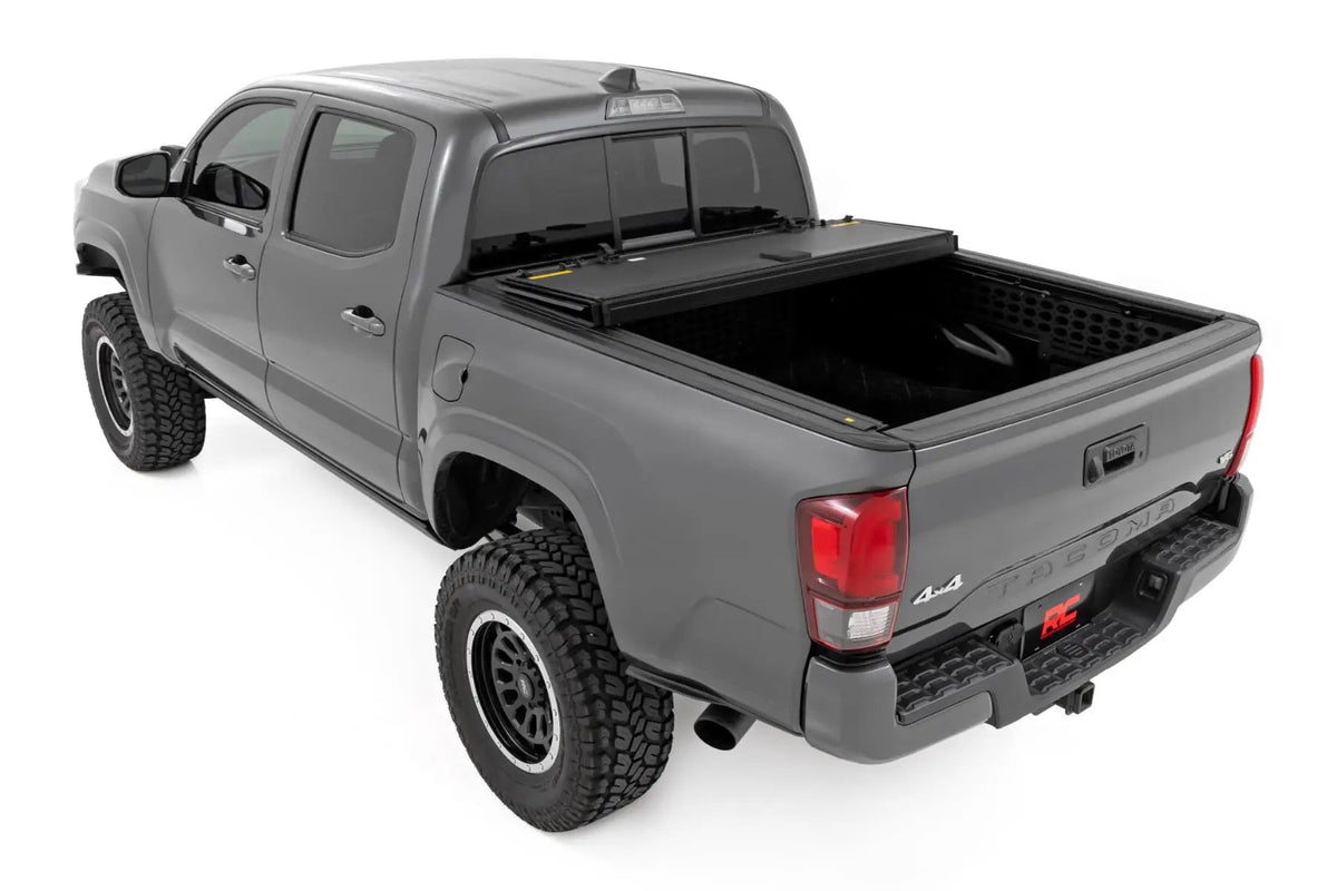 Hard Tri-Fold Flip Up Bed Cover | 5' Bed | Toyota Tacoma 2WD/4WD (2005-2015) by Rough Country