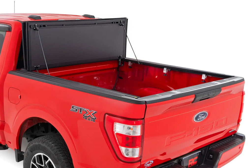 Hard Tri-Fold Flip Up Bed Cover | 5'7" Bed | Ford F-150 2WD/4WD (2015-2020) by Rough Country