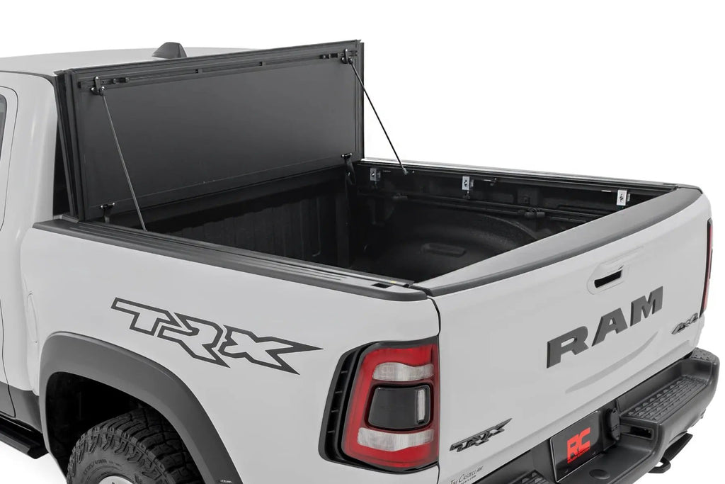 Hard Tri-Fold Flip Up Bed Cover | 6'4" | Ram 1500 (19-26)/1500 TRX (21-24) by Rough Country