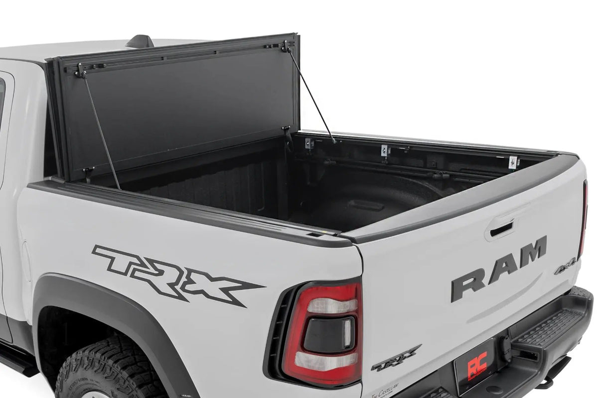 Hard Tri-Fold Flip Up Bed Cover | 6'4" | Ram 1500 (19-26)/1500 TRX (21-24) by Rough Country