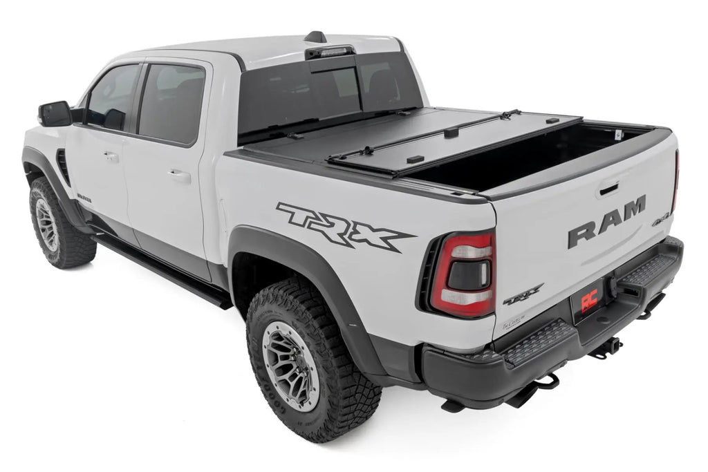 Hard Tri-Fold Flip Up Bed Cover | 6'4" | Ram 1500 (19-26)/1500 TRX (21-24) by Rough Country