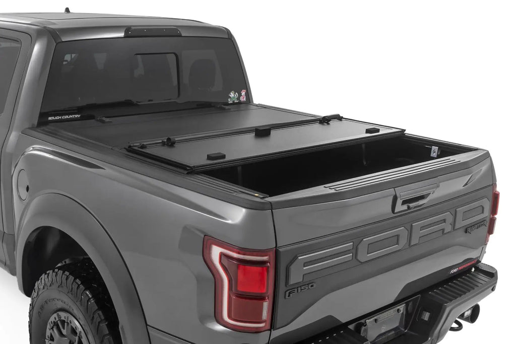 Hard Tri-Fold Flip Up Bed Cover | 5'7" Bed | Ford F-150 (21-26)/F-150 Lightning (22-26) by Rough Country