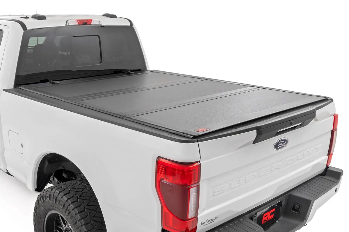 Hard Tri-Fold Flip Up Bed Cover | 6'10" Bed | Ford F-250/F-350 Super Duty (17-26) by Rough Country