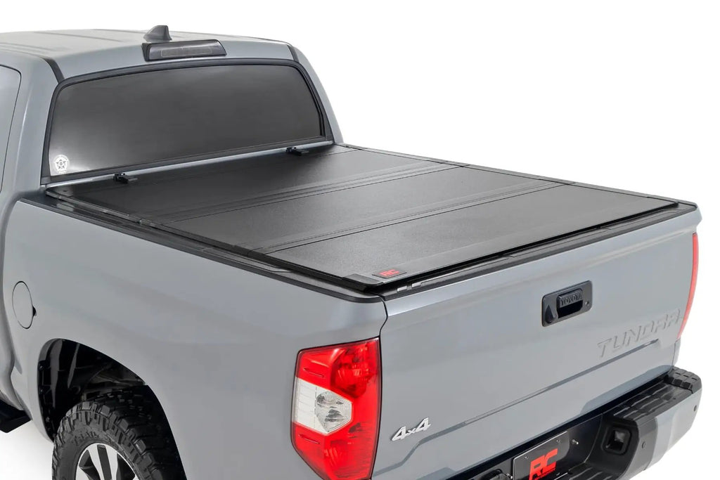 Hard Tri-Fold Flip Up Bed Cover | 5'7" Bed | Toyota Tundra 2WD/4WD (07-21) by Rough Country