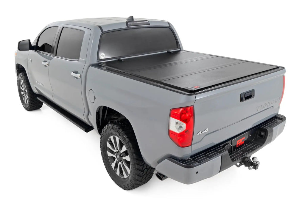 Hard Tri-Fold Flip Up Bed Cover | 5'7" Bed | Toyota Tundra 2WD/4WD (07-21) by Rough Country
