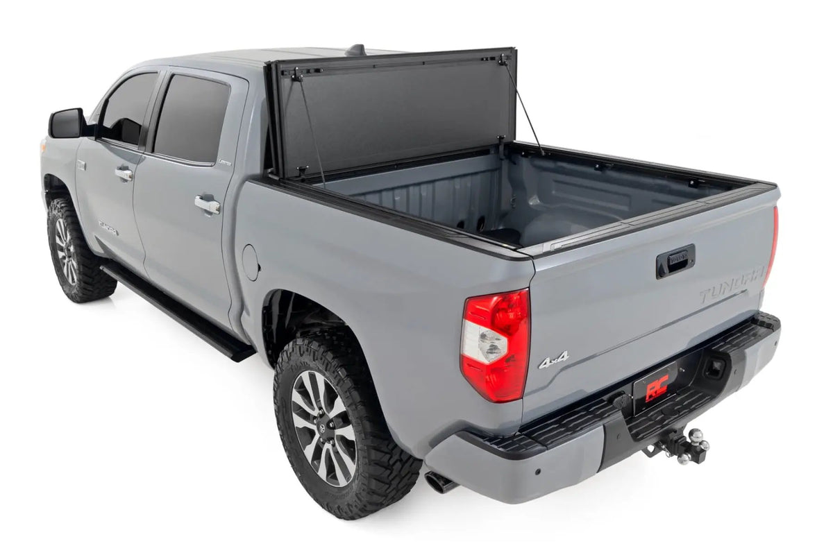 Hard Tri-Fold Flip Up Bed Cover | 5'7" Bed | Toyota Tundra 2WD/4WD (07-21) by Rough Country