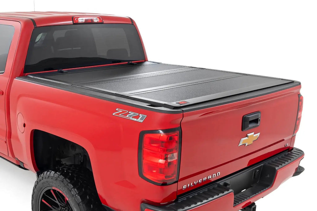 Hard Tri-Fold Flip Up Bed Cover | 5'9" Bed | Chevy/GMC 1500 (14-18 & Classic) by Rough Country