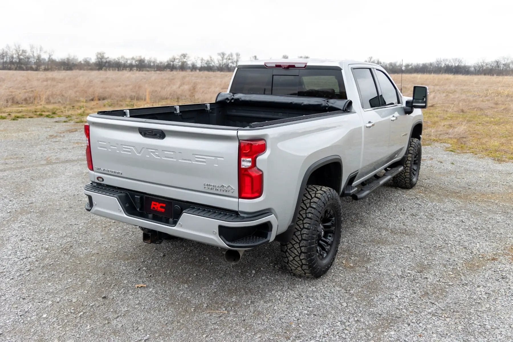 Soft Roll Up Bed Cover | 6'9" Bed | Chevy/GMC 2500HD/3500HD (20-26) by Rough Country