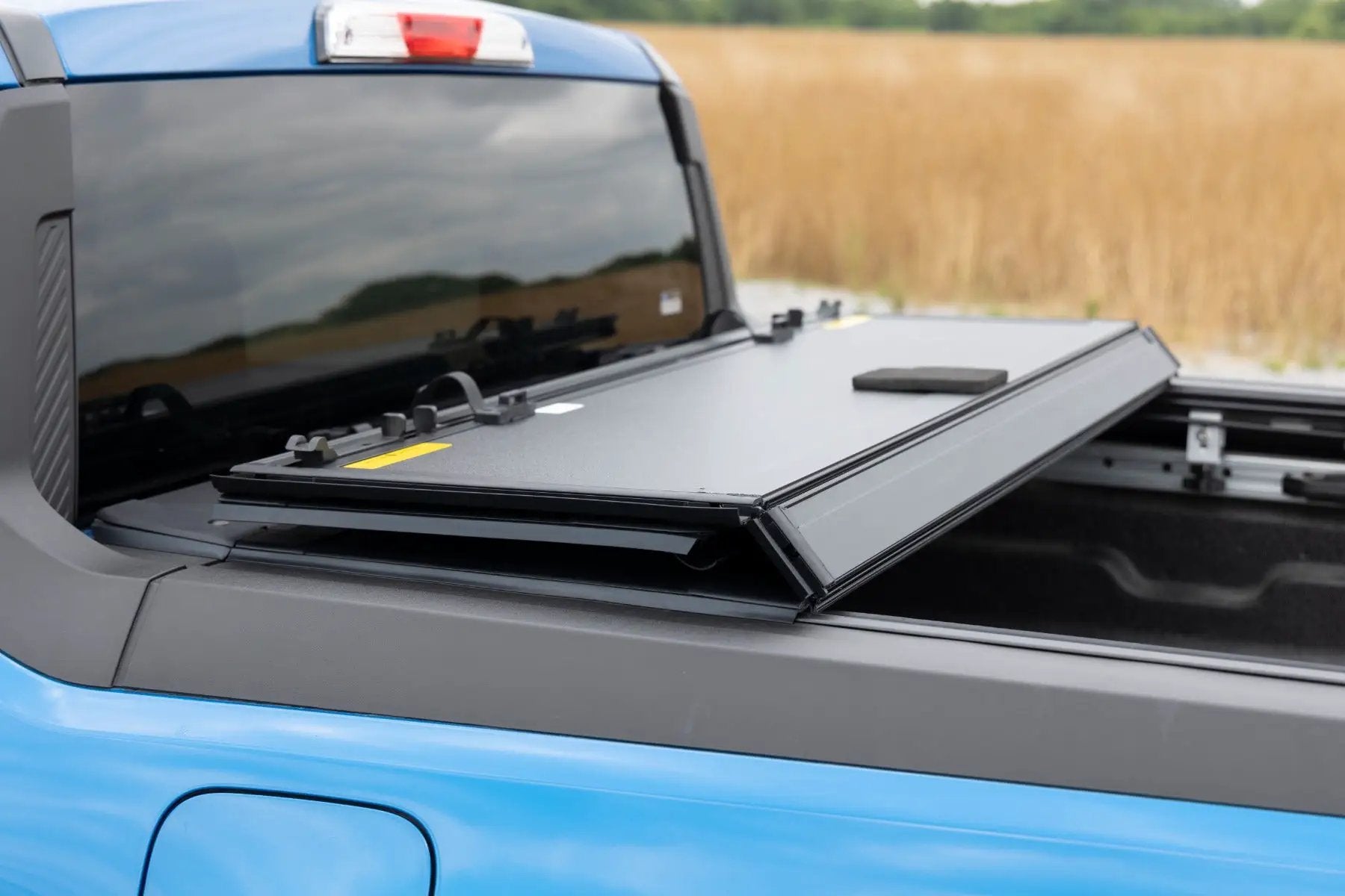Hard Tri-Fold Flip Up Bed Cover | 4'6" Bed | Ford Maverick 2WD/4WD (22-26) by Rough Country