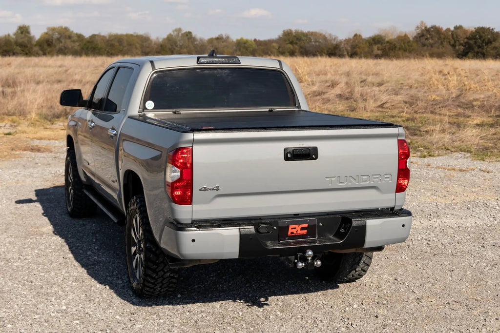 Hard Tri-Fold Flip Up Bed Cover | 5'7" Bed | Toyota Tundra 2WD/4WD (07-21) by Rough Country