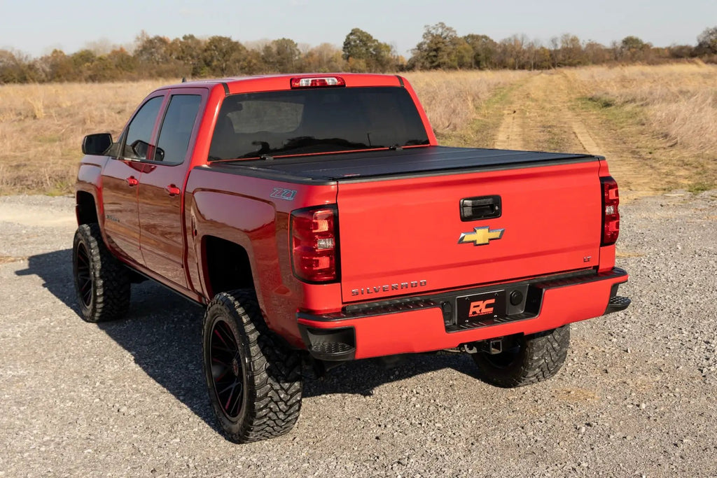 Hard Tri-Fold Flip Up Bed Cover | 5'9" Bed | Chevy/GMC 1500 (14-18 & Classic) by Rough Country
