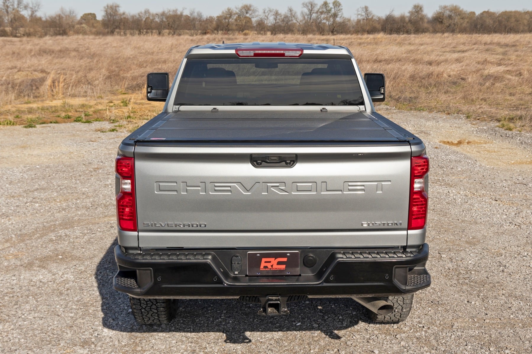 Hard Tri-Fold Flip Up Bed Cover | 6'9" Bed | Chevy/GMC Silverado/Sierra 2500HD/3500HD (20-26) by Rough Country