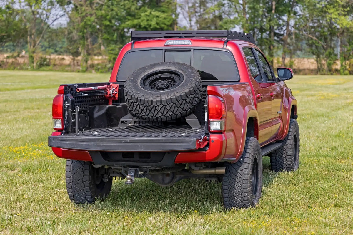 Bed Mount Spare Tire Carrier | Universal (5x5.5 6x5.5 6x135 & 5x5.0 Bolt Patterns) by Rough Country