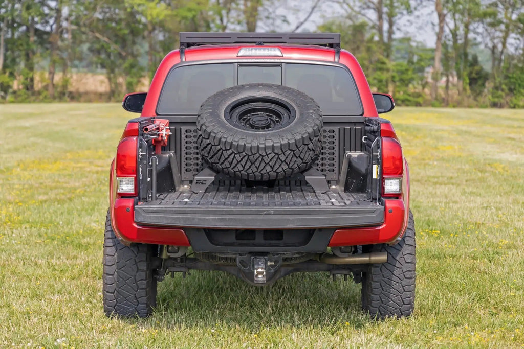Bed Mount Spare Tire Carrier | Universal (5x5.5 6x5.5 6x135 & 5x5.0 Bolt Patterns) by Rough Country