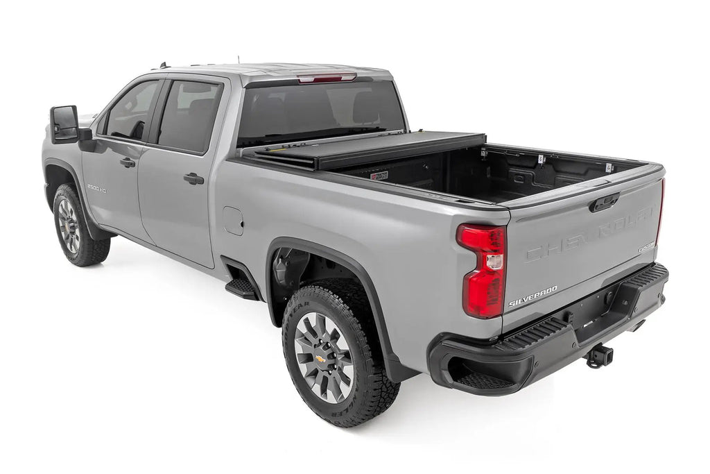 Hard Tri-Fold Flip Up Bed Cover | 6'9" Bed | Chevy/GMC  Silverado/Sierra 2500HD/3500HD (20-26)