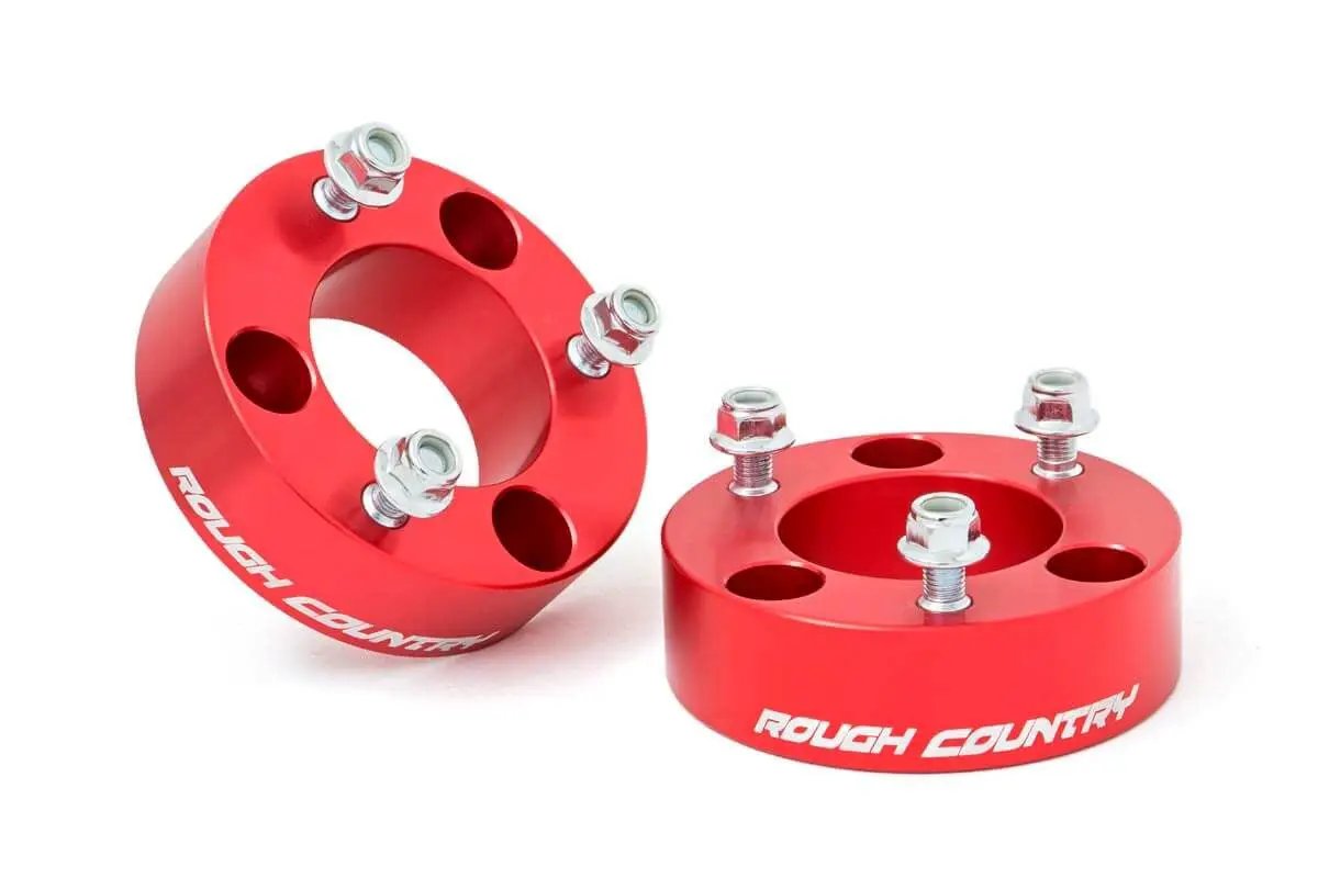 2.5 Inch Leveling Kit | Red Spacers | Nissan Frontier (05-26)/Xterra (05-15) by Rough Country