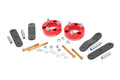 2.5 Inch Leveling Kit | Red Spacers | Nissan Frontier (05-26)/Xterra (05-15) by Rough Country