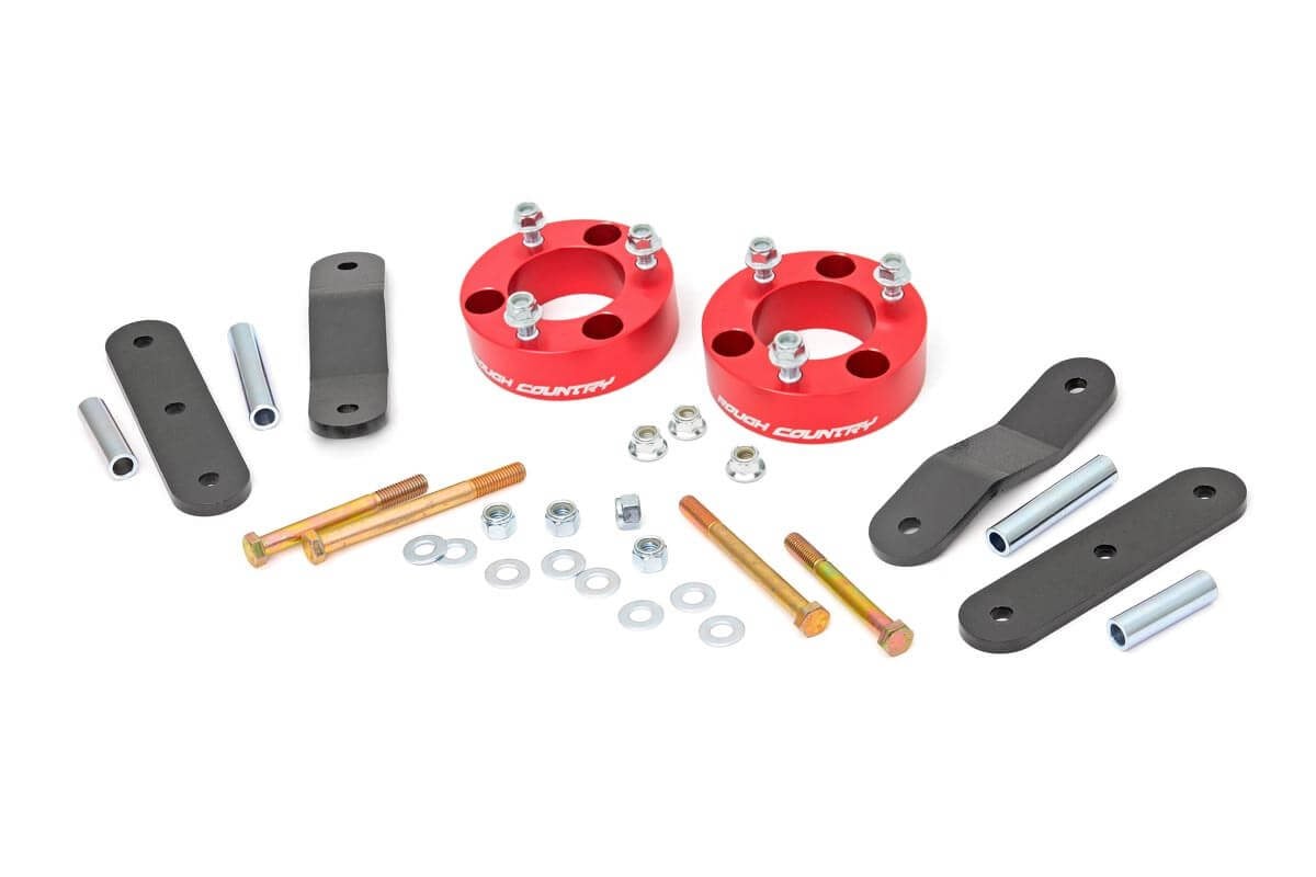 2.5 Inch Leveling Kit | Red Spacers | Nissan Frontier (05-26)/Xterra (05-15) by Rough Country